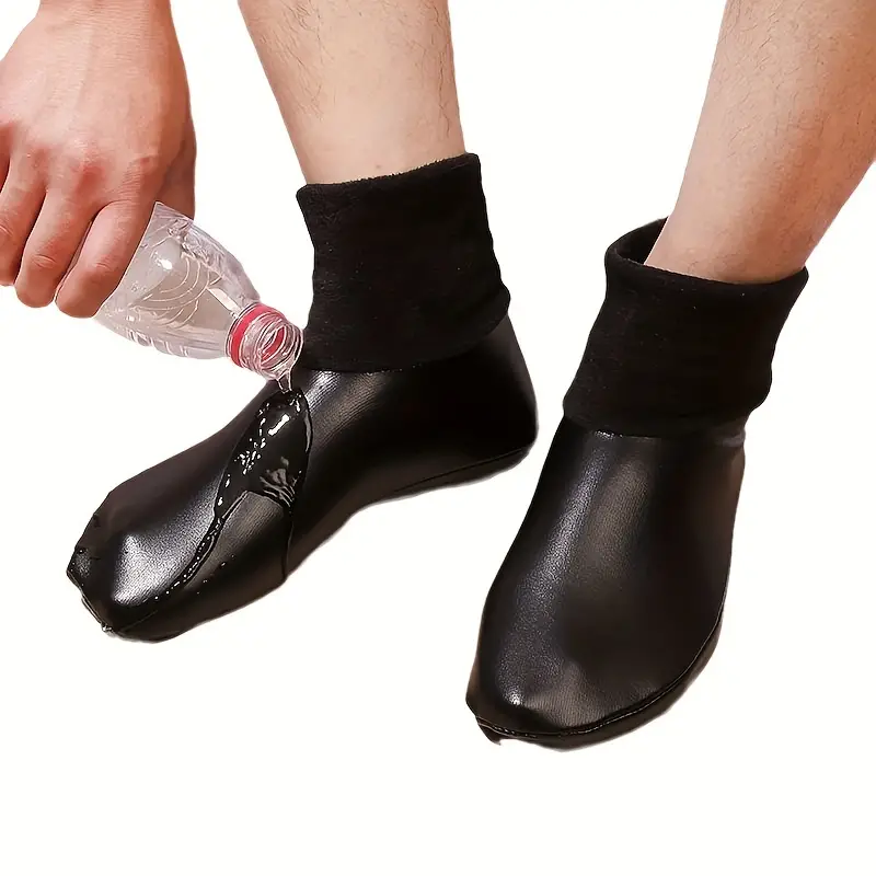  un par de calcetines  negro impermeable y anti deslizante con revestimiento interno con función térmica y elegante color negro unisex ideal para el frio